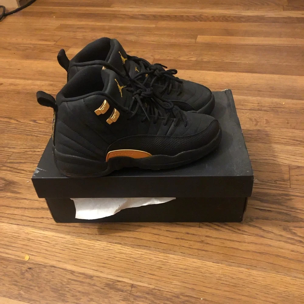 Jordan Men’s Black and Gold High-Top Sneakers